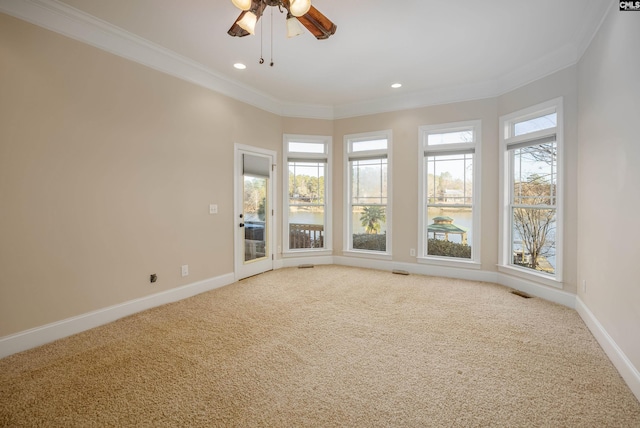 spare room featuring recessed lighting, baseboards, carpet, and ornamental molding