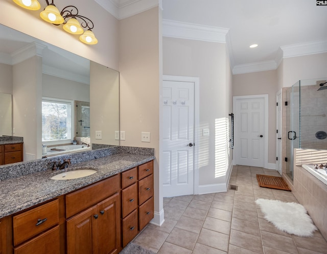 full bathroom featuring a stall shower, crown molding, tile patterned flooring, a bath, and vanity