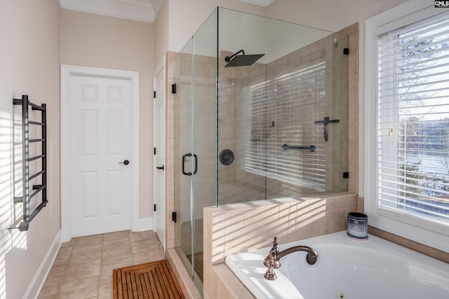 full bath with baseboards, a stall shower, a whirlpool tub, crown molding, and tile patterned floors