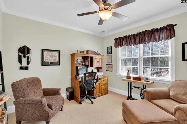 office area featuring light colored carpet, baseboards, crown molding, and ceiling fan