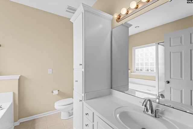 141 Vista Oaks Dr, Lexington, SC 29072 - full bath featuring tile patterned flooring, baseboards, toilet, a bath, and vanity