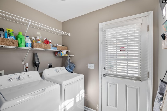 laundry area featuring laundry area and washer and clothes dryer