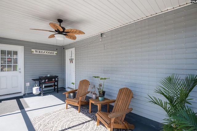 view of patio featuring a ceiling fan