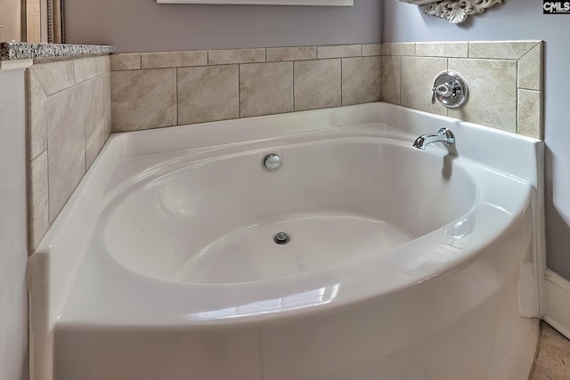 full bathroom with a garden tub