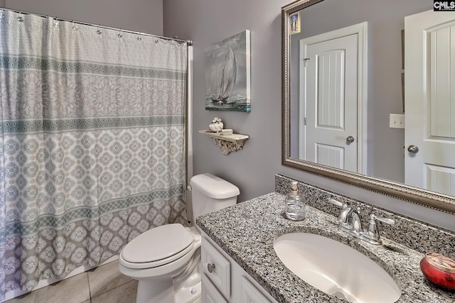 full bathroom featuring a shower with curtain, toilet, vanity, and tile patterned flooring