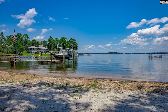 view of dock with a water view