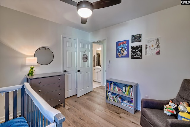 bedroom featuring ceiling fan and light wood-style floors