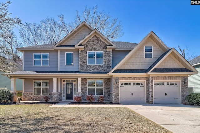 craftsman house with a porch, stone siding, roof with shingles, and driveway