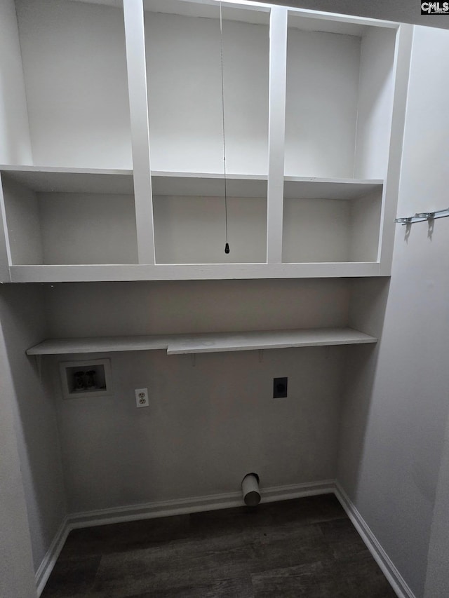 laundry area with dark wood finished floors, laundry area, hookup for an electric dryer, washer hookup, and baseboards