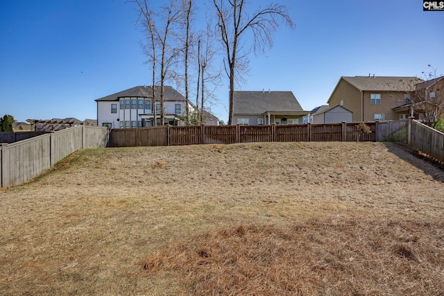 view of yard featuring a fenced backyard