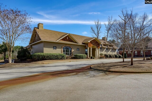 view of front of property featuring a chimney