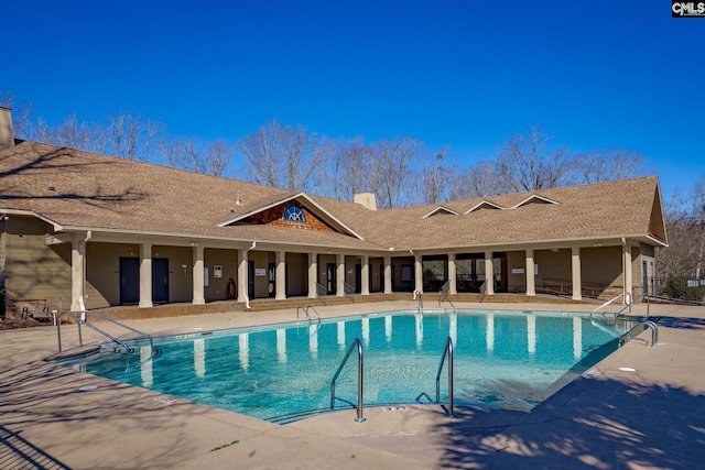 community pool featuring a patio area