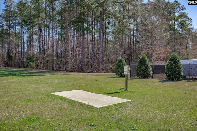 view of yard featuring a view of trees