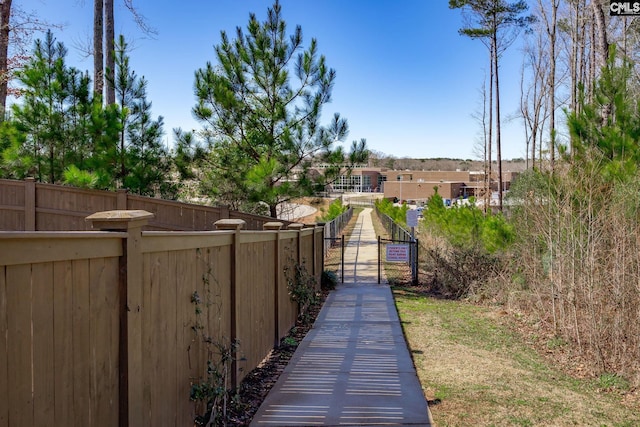 view of yard featuring a gate and fence