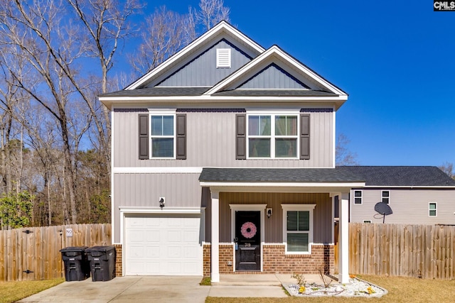 view of front of house with brick siding, fence, roof with shingles, a garage, and driveway