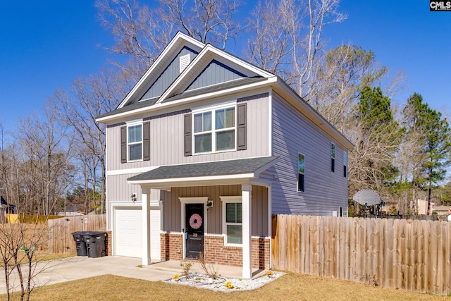 view of front facade with driveway, fence, roof with shingles, board and batten siding, and an attached garage