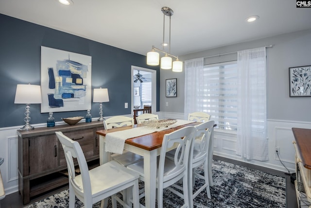 dining space with recessed lighting, ceiling fan, and wainscoting