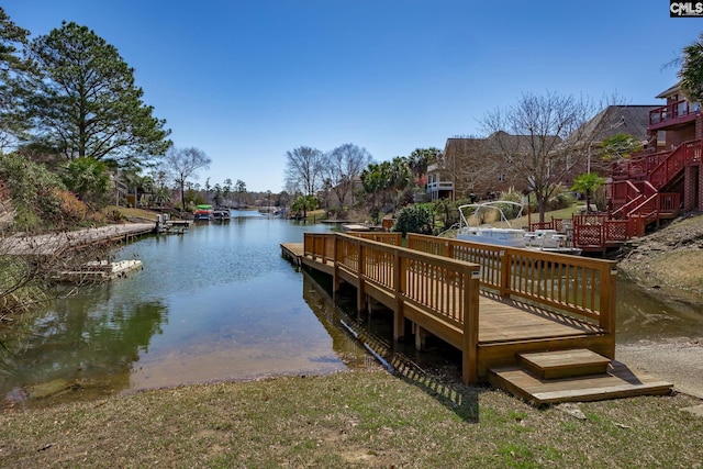 dock area with a water view