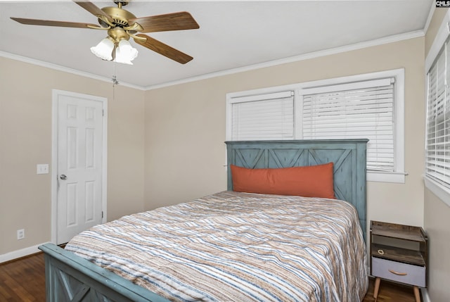 bedroom with dark wood-style floors, ceiling fan, baseboards, and ornamental molding