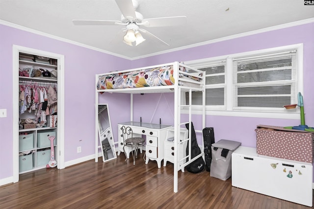 bedroom with ceiling fan, wood finished floors, and ornamental molding