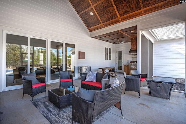 view of patio / terrace with outdoor lounge area and a ceiling fan