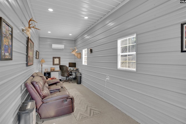 interior space featuring an AC wall unit and recessed lighting