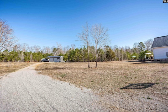 view of road with driveway