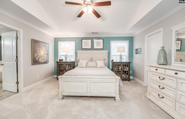 bedroom featuring visible vents, baseboards, and light colored carpet