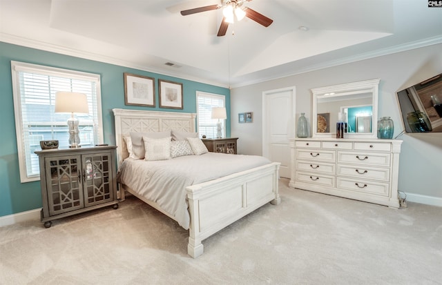 bedroom with visible vents, light colored carpet, baseboards, and lofted ceiling