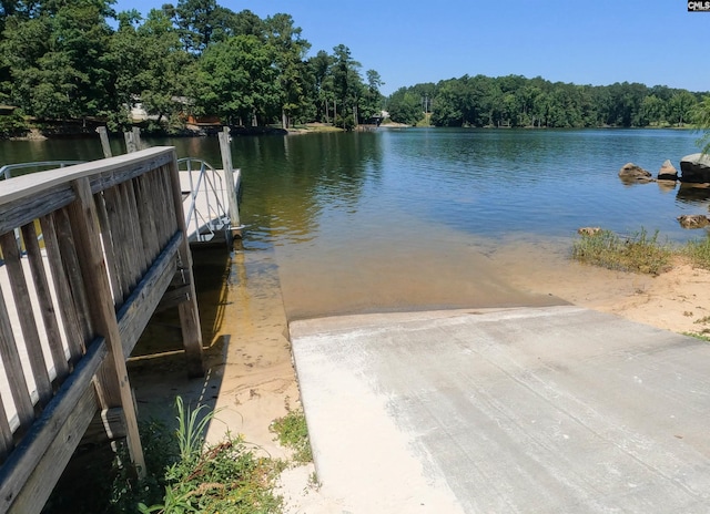 dock area featuring a water view