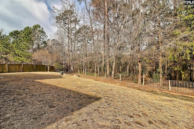 view of yard featuring fence