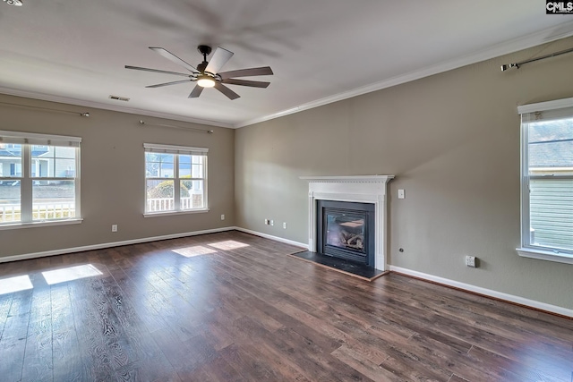 unfurnished living room featuring dark wood-style flooring, visible vents, a ceiling fan, and ornamental molding