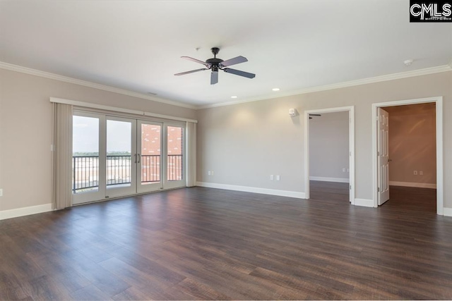 unfurnished room featuring baseboards, dark wood-style floors, a ceiling fan, and crown molding