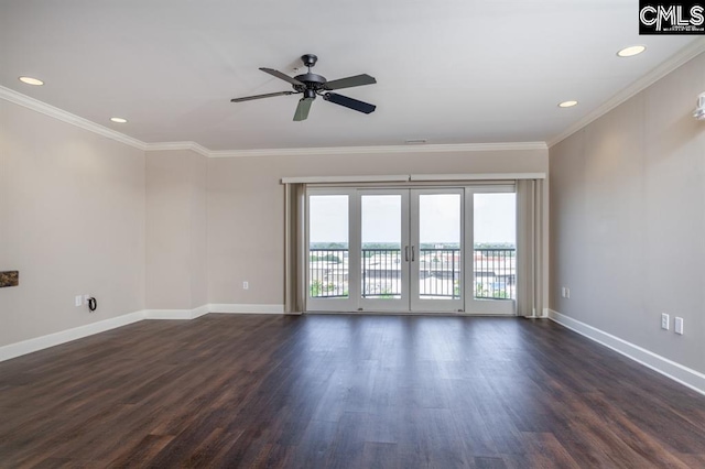 unfurnished room featuring dark wood-style floors, baseboards, french doors, and ornamental molding