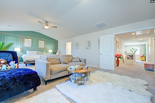 carpeted bedroom with visible vents, baseboards, and vaulted ceiling