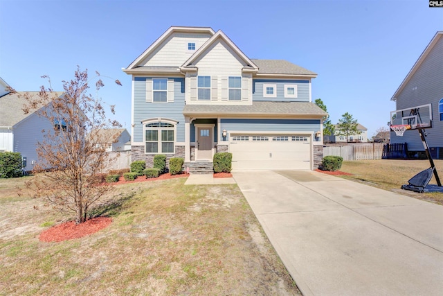 craftsman house featuring a front lawn, fence, concrete driveway, a garage, and stone siding