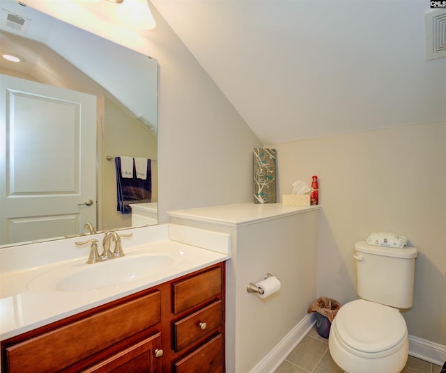 half bath featuring tile patterned floors, visible vents, toilet, vanity, and vaulted ceiling