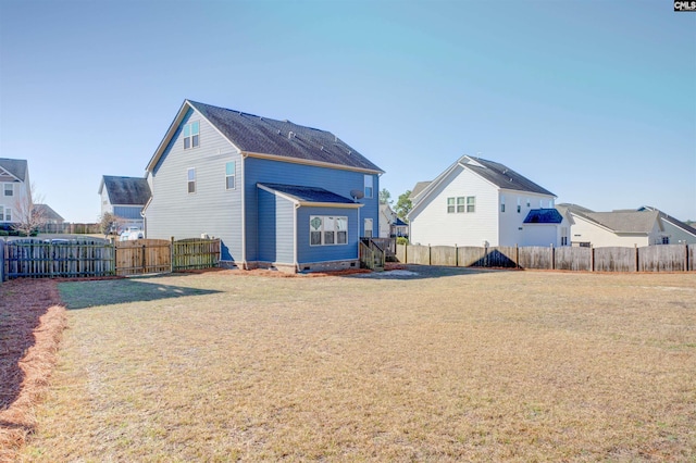 exterior space with a fenced backyard