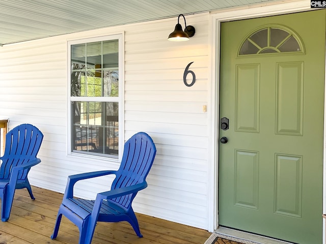 entrance to property with a porch