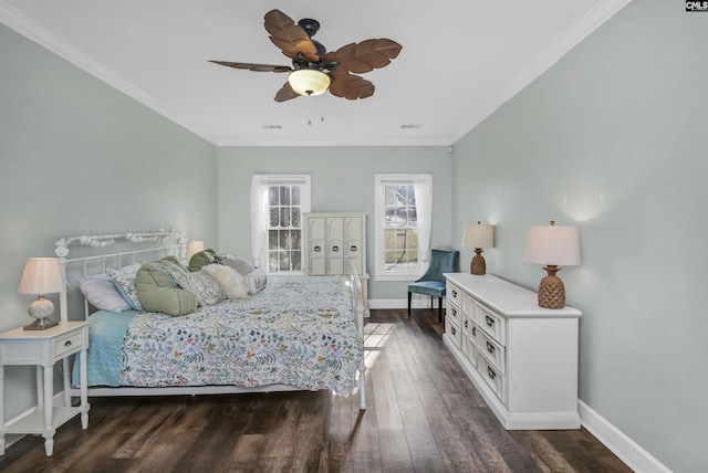 bedroom featuring baseboards, dark wood finished floors, and ornamental molding