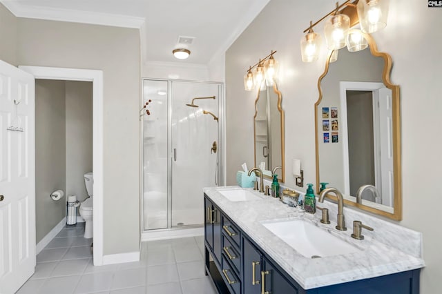 full bathroom featuring tile patterned floors, crown molding, a shower stall, and a sink