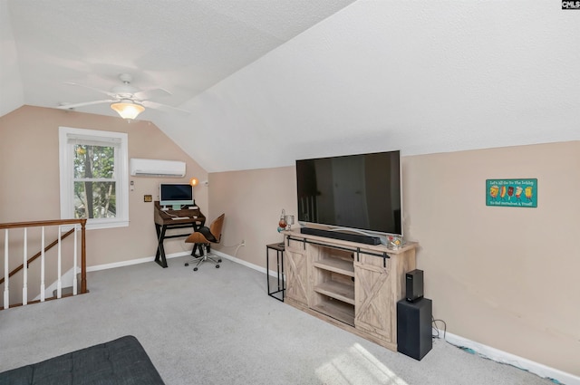 interior space featuring lofted ceiling, a wall unit AC, carpet flooring, baseboards, and ceiling fan