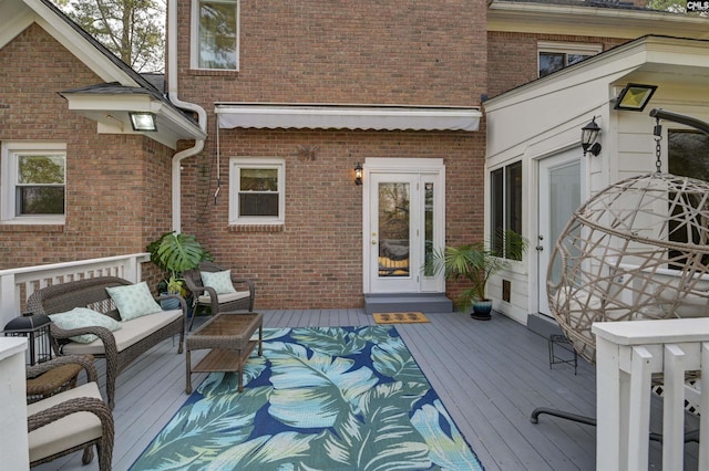 wooden deck featuring an outdoor hangout area