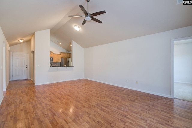 unfurnished living room featuring a ceiling fan, light wood-style floors, and baseboards