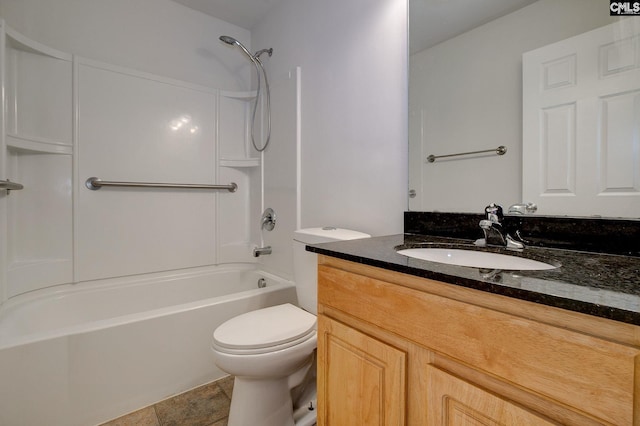 bathroom featuring vanity, toilet, and bathing tub / shower combination