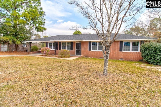 ranch-style home featuring crawl space, an attached carport, brick siding, and a front yard