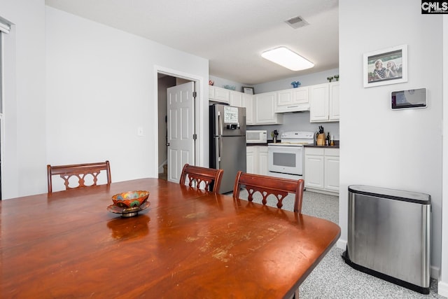 dining space with visible vents