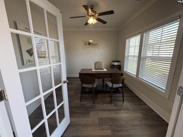 home office featuring dark wood-style floors, baseboards, crown molding, and ceiling fan