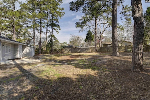 view of yard with fence