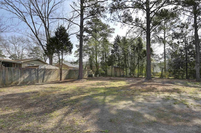 view of yard with fence